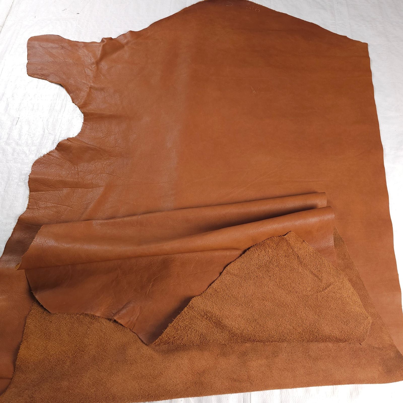 Tan veg tan leather cut section