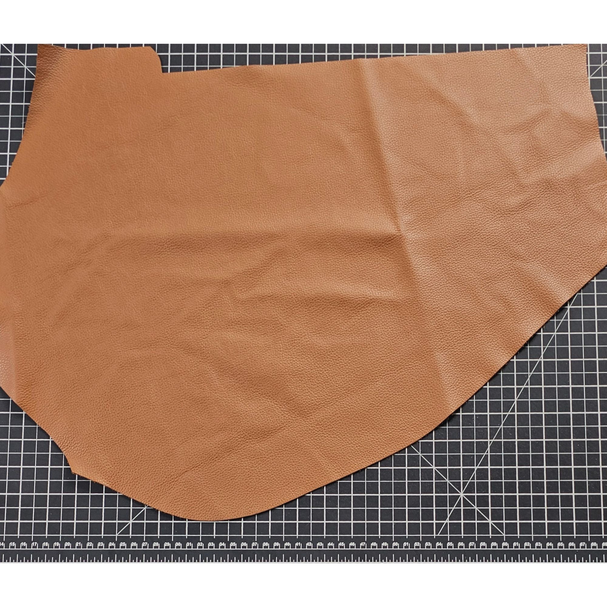 Warm brown full-grain cowhide leather remnant for leathercraft