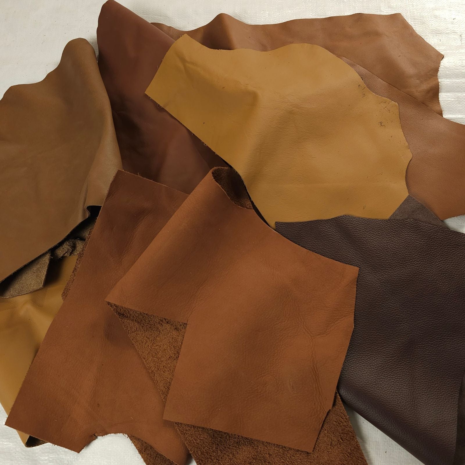 Brown leather scraps 1 to 3 hands