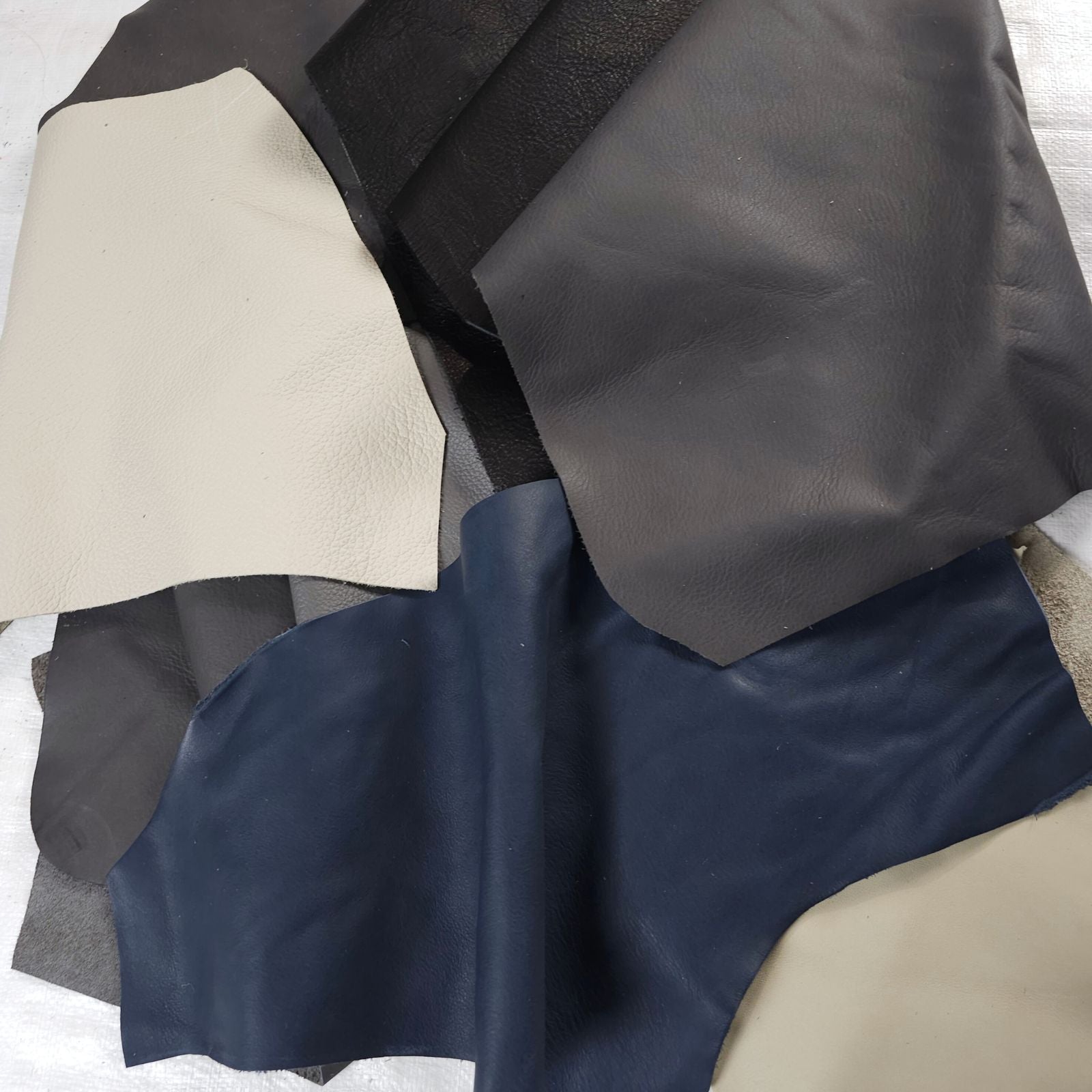 Dark neutral leather scraps 1 to 3 hands