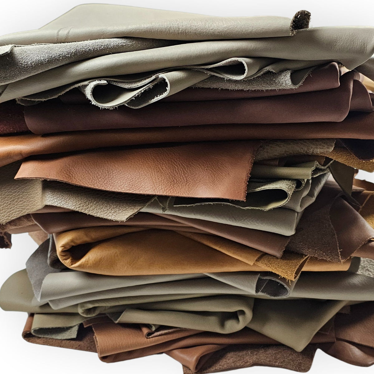 Earth tone leather pieces in assorted brown and natural shades