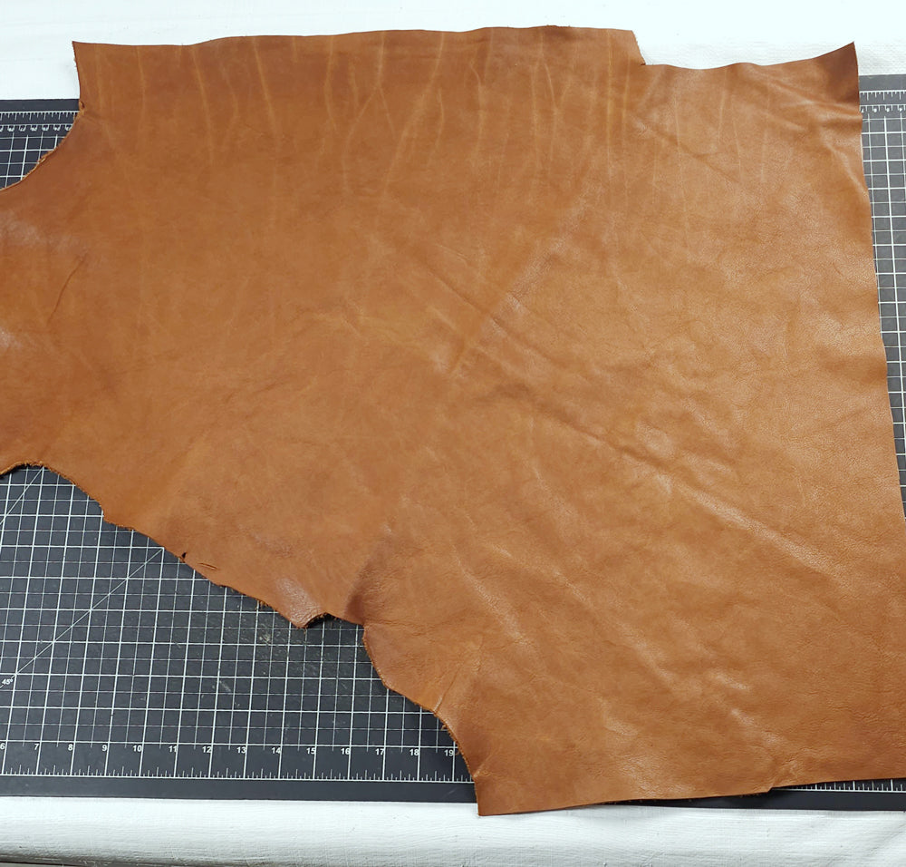 Soft, pliable veg tanned leather remnants with natural grain and character marks