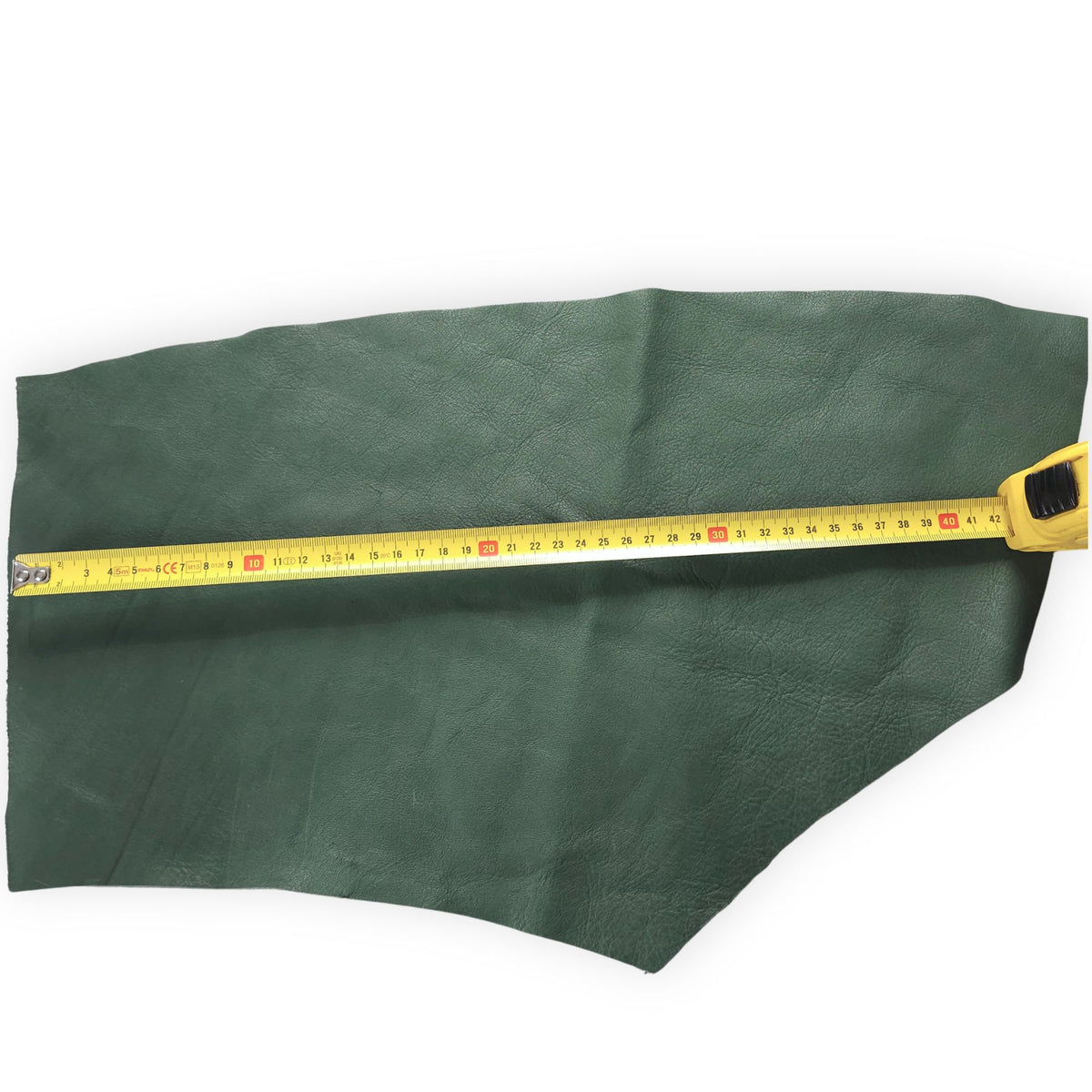 Mixed forest green vegetable-tanned cowhide piece in 1–3 hand sizes