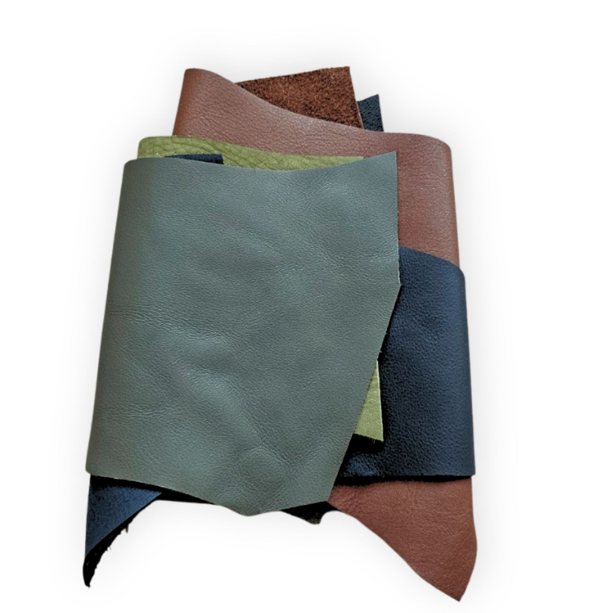 Green, navy and brown genuine leather samples showing different finishes