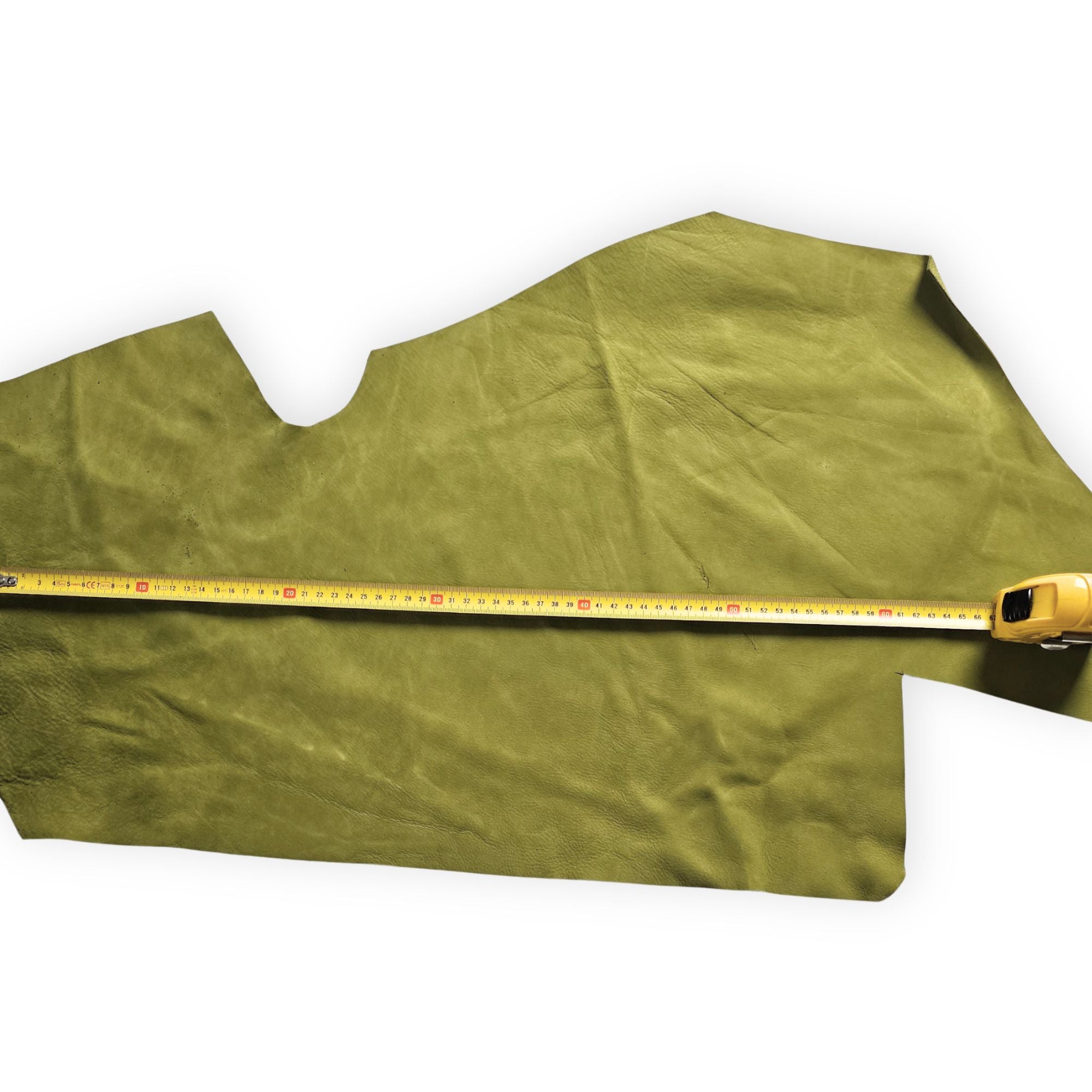Olive green nubuck leather piece shown with measuring tape