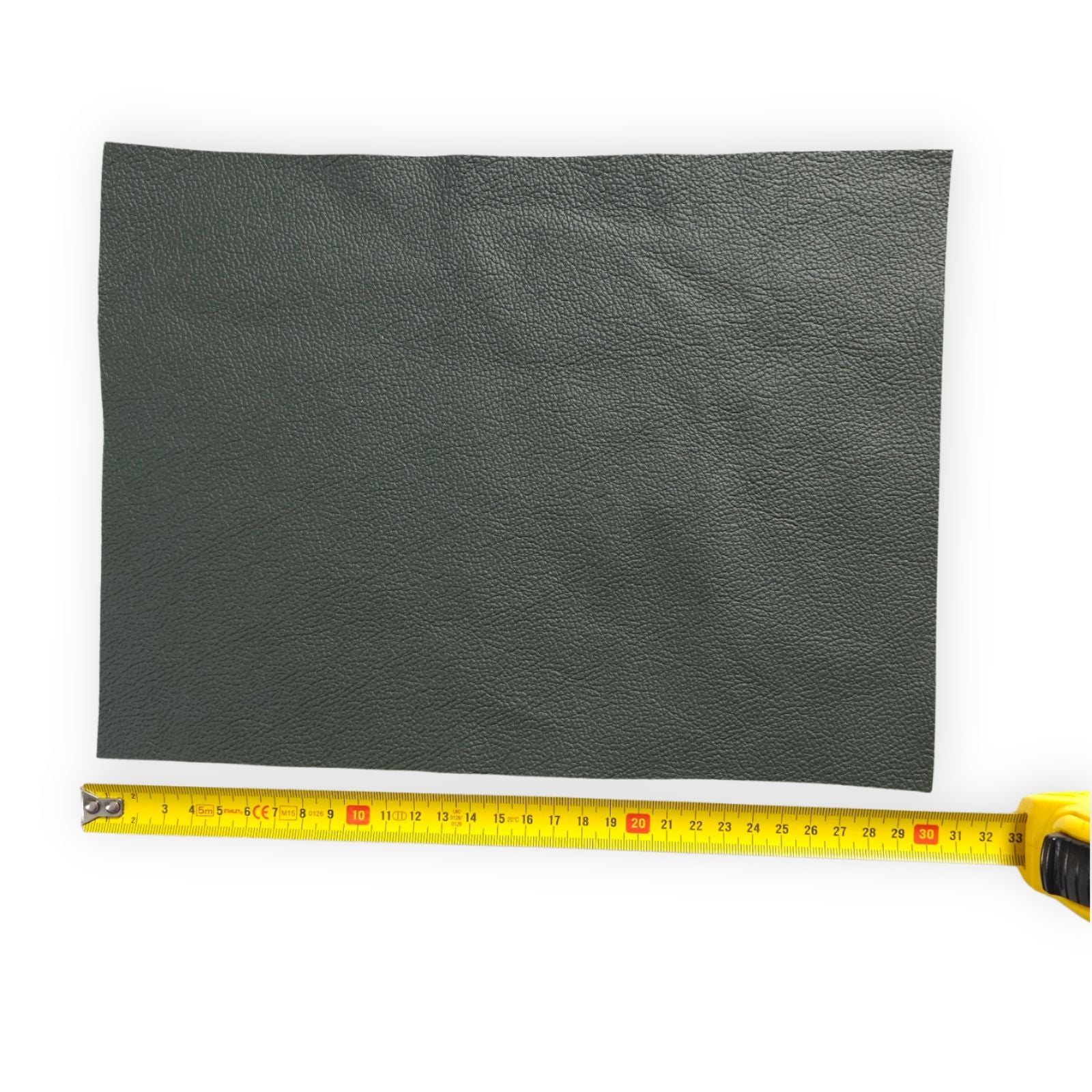 Dark grey cowhide leather panel with measuring tape