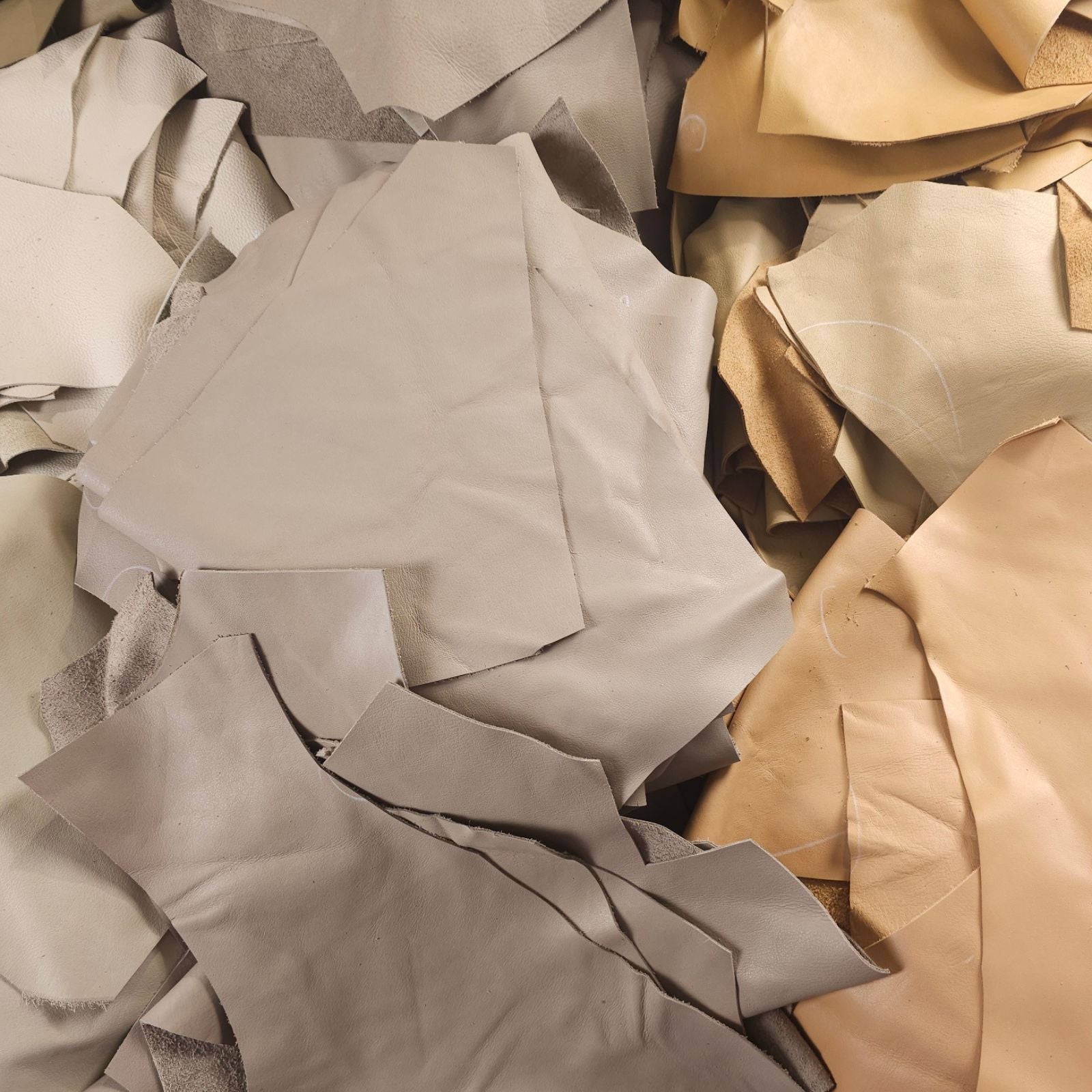 Mixed light neutral leather scraps in beige and taupe shades