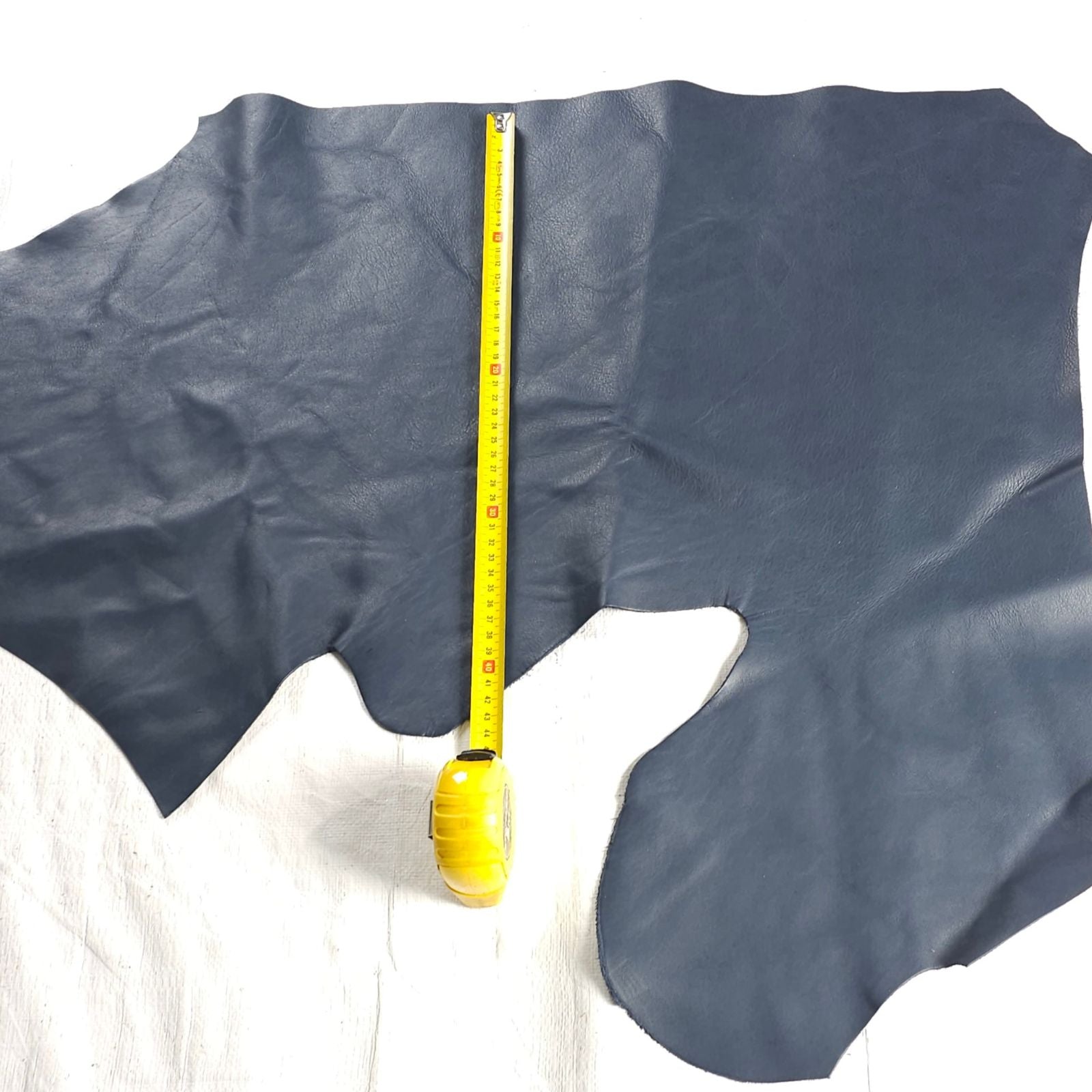 Medium dark blue leather remnant size example 1 to 2 sq ft
