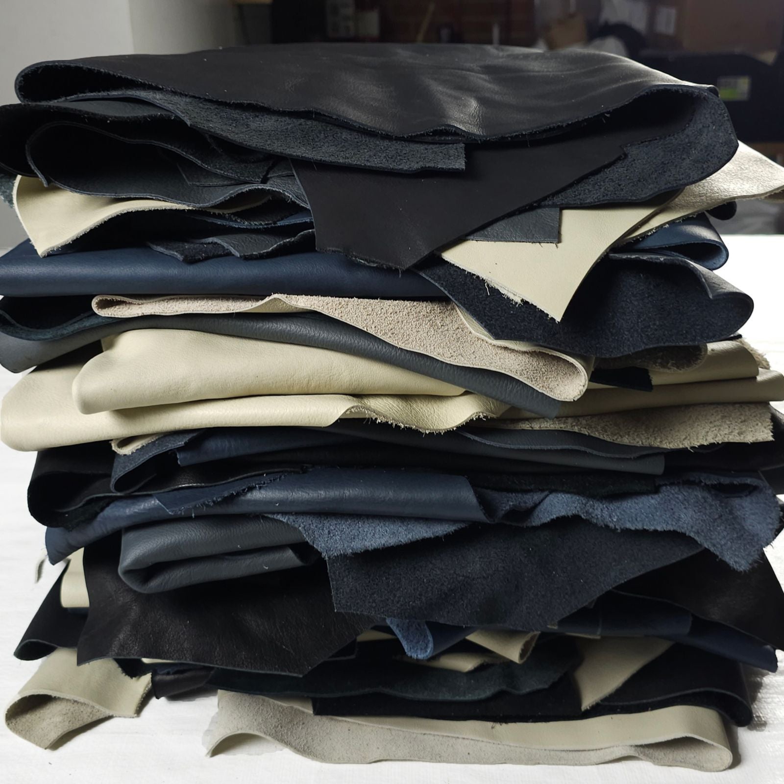 Medium mixed colour leather remnants dark tones stacked 1 to 2 sq ft