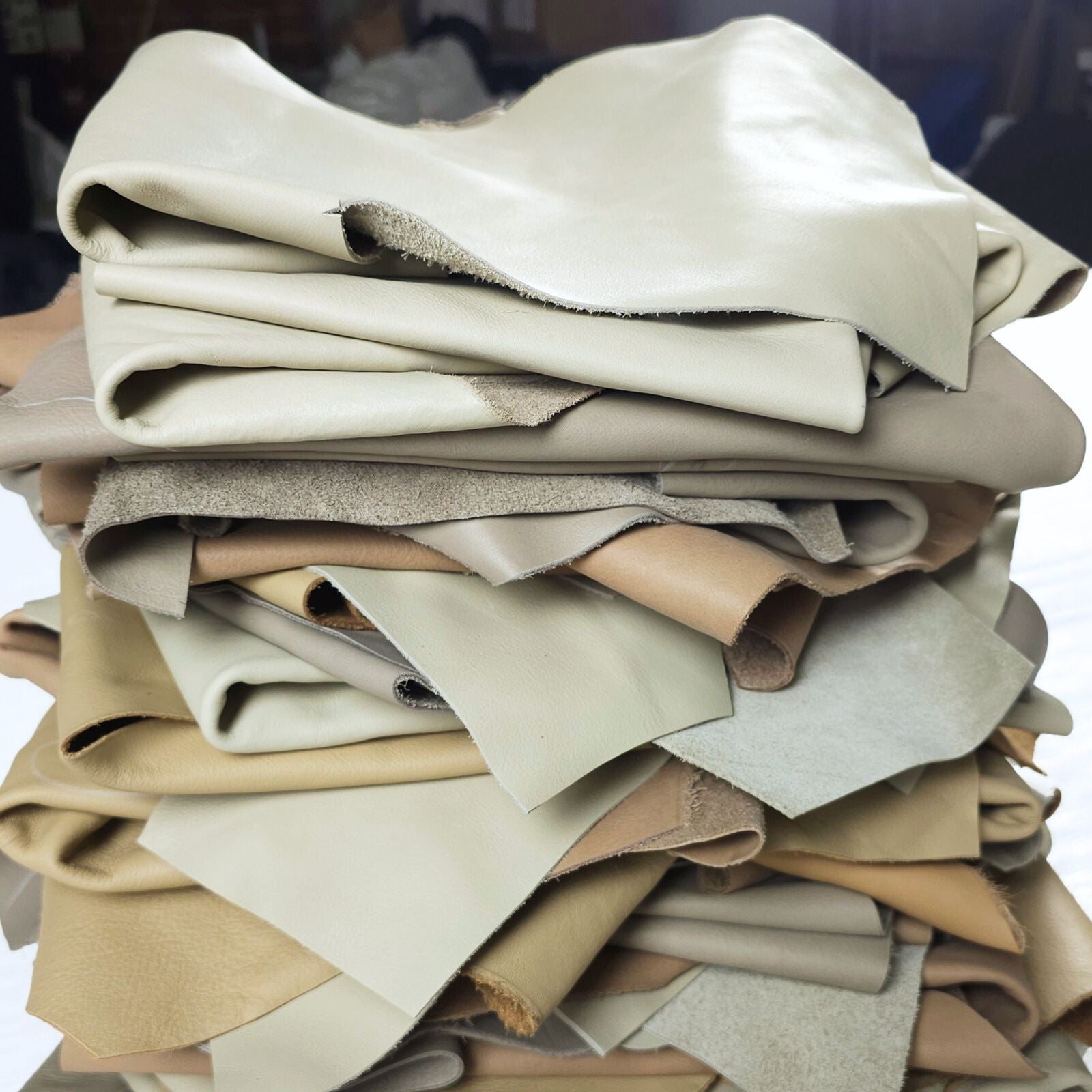 Medium mixed colour leather remnants light tones stacked 1 to 2 sq ft