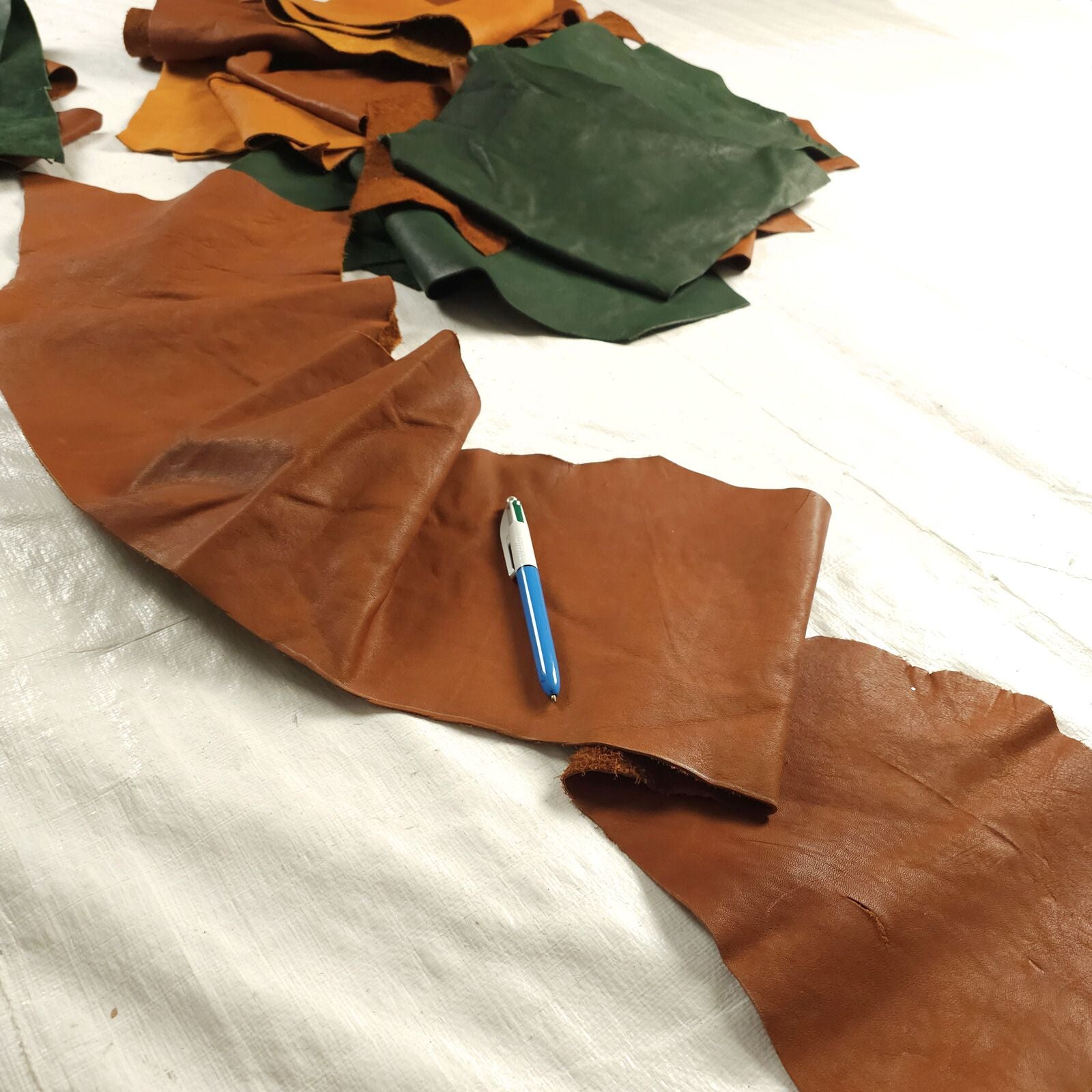 Small veg tan leather sections laid out