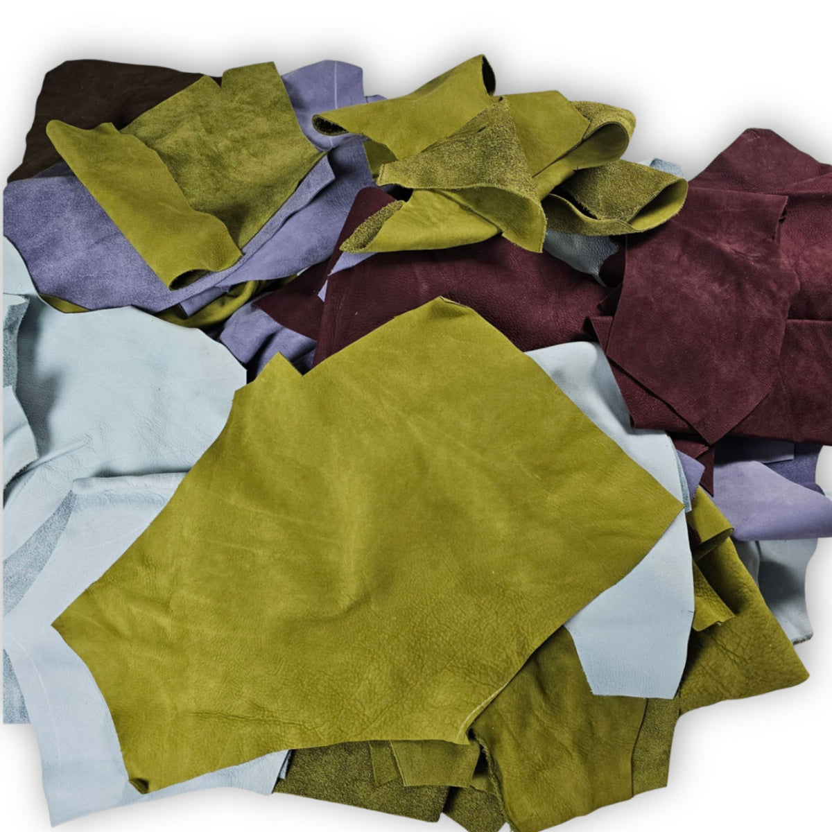 Mixed-colour velvety soft nubuck leather scraps in 1–3 hand-sized pieces