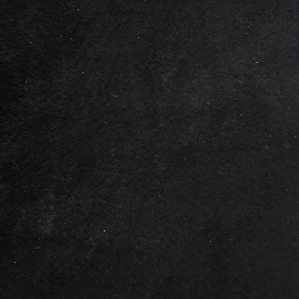 Black pigskin lining leather showing suede texture