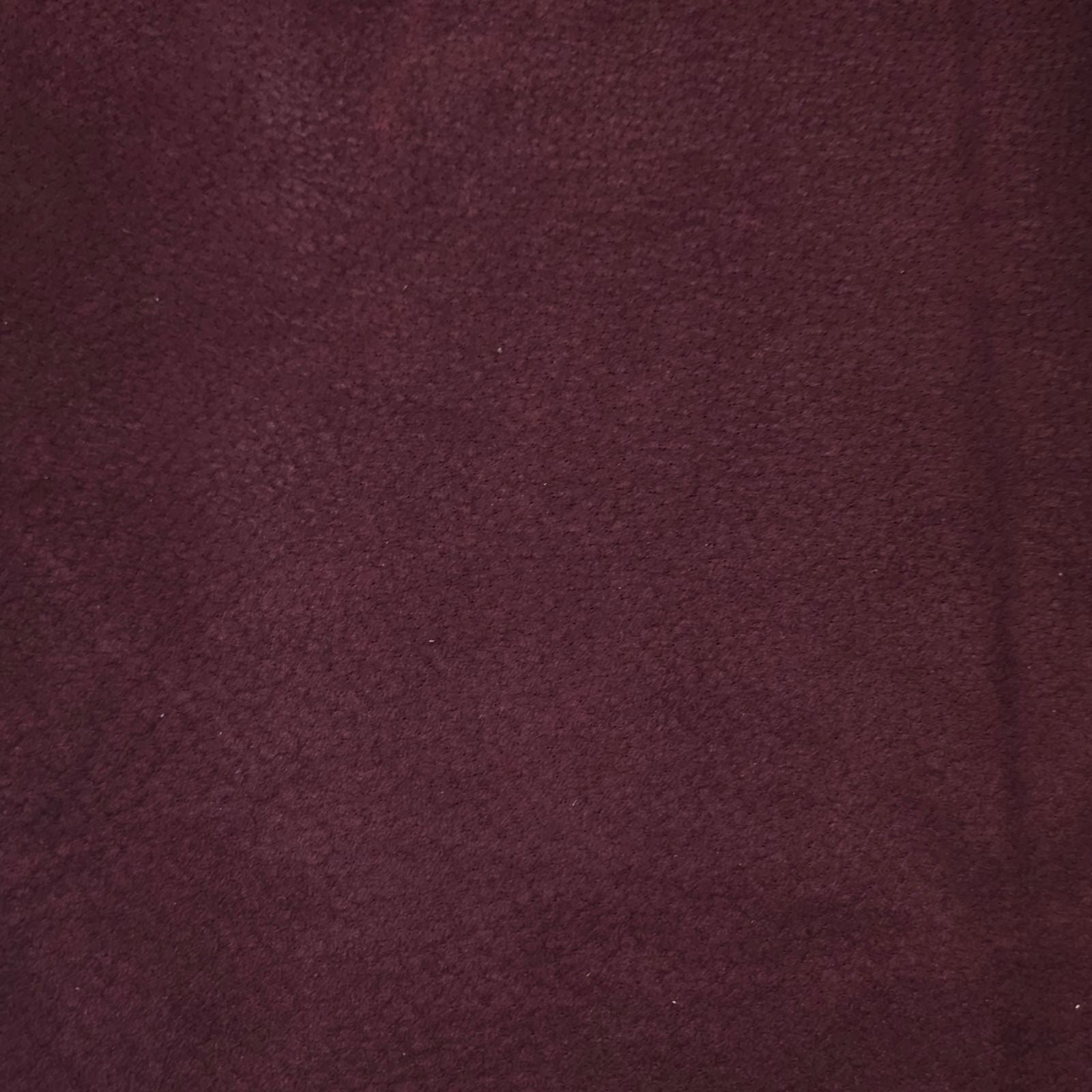 Burgundy pigskin lining leather showing suede texture