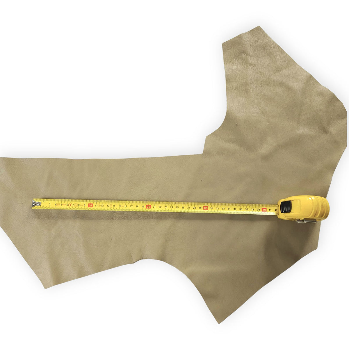 Sage green cowhide leather piece with tape measure for size reference