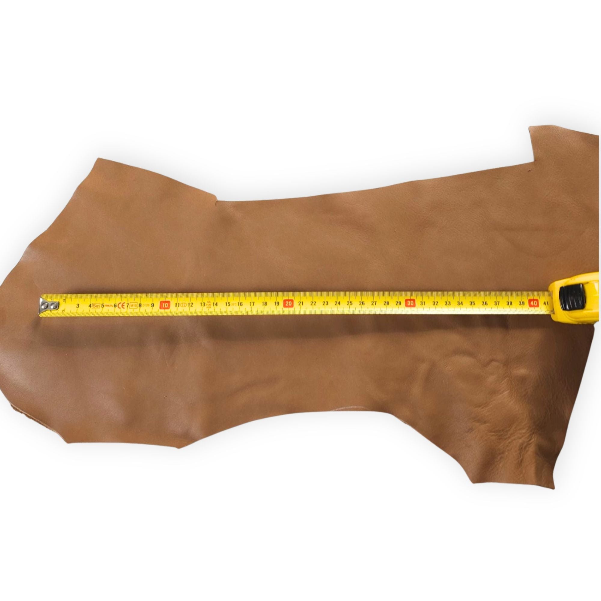 Dark brown cowhide leather scrap shown with measuring tape