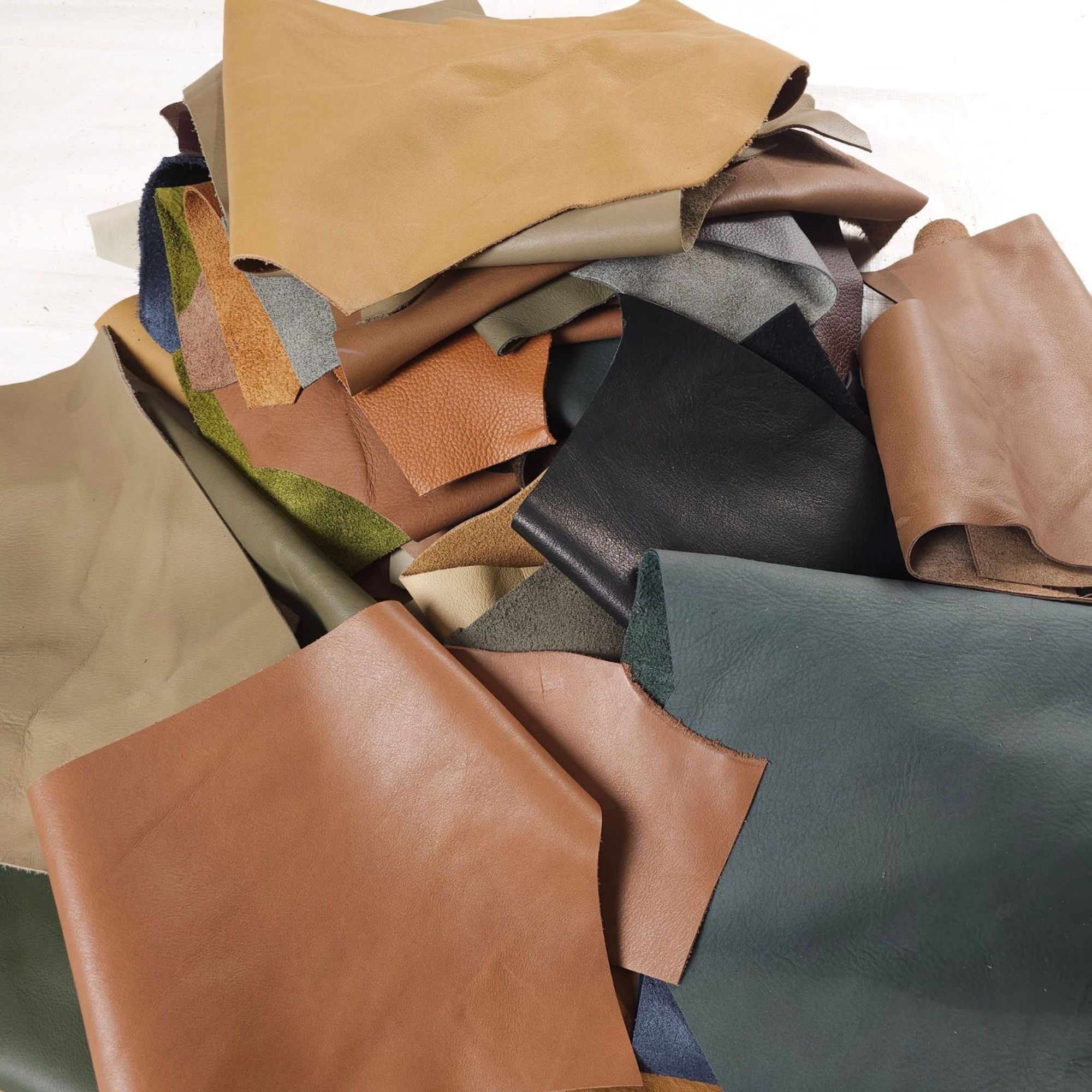 Assorted mixed leather offcuts in different colours and textures