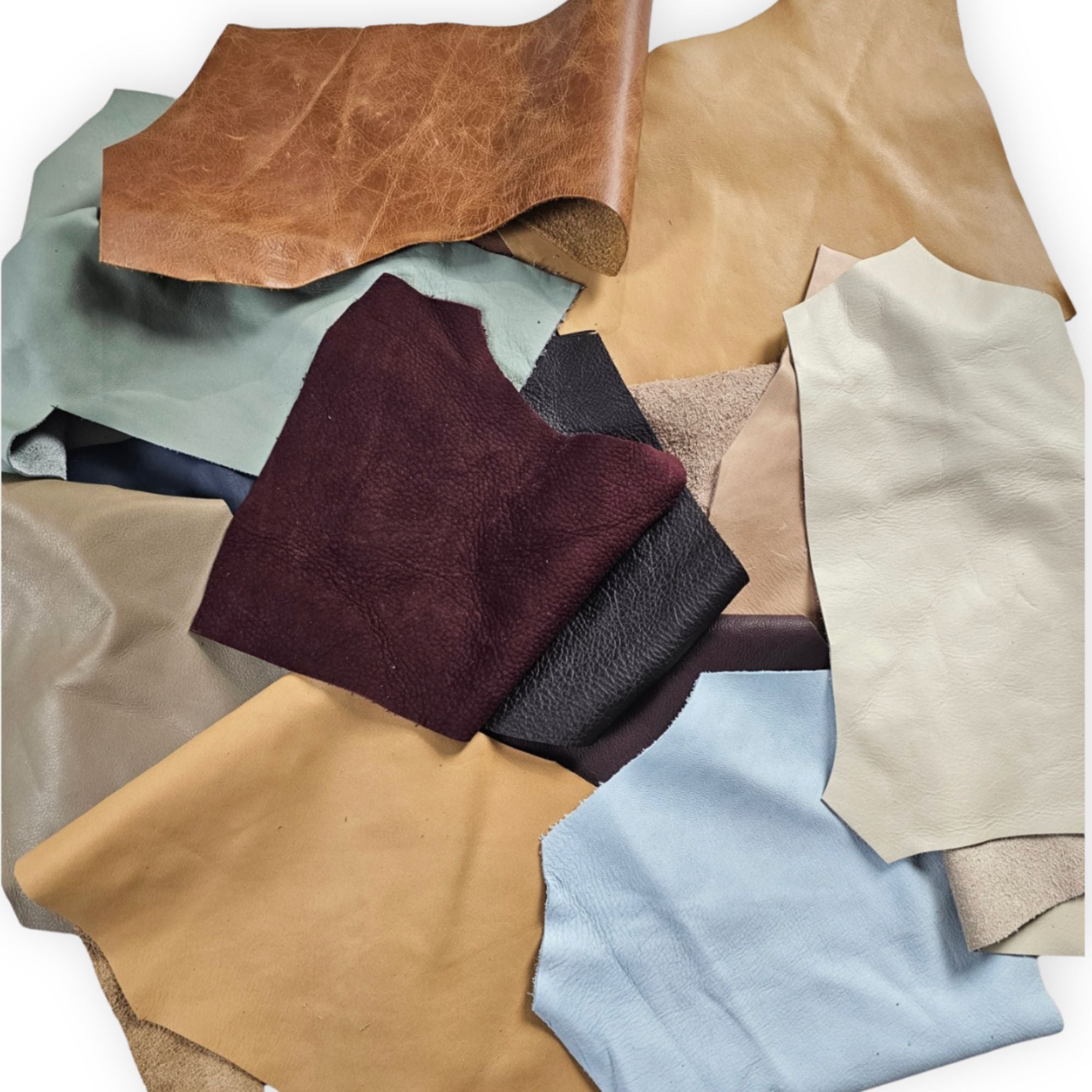Soft leather scraps in assorted colours and 1–3 hand-sized pieces