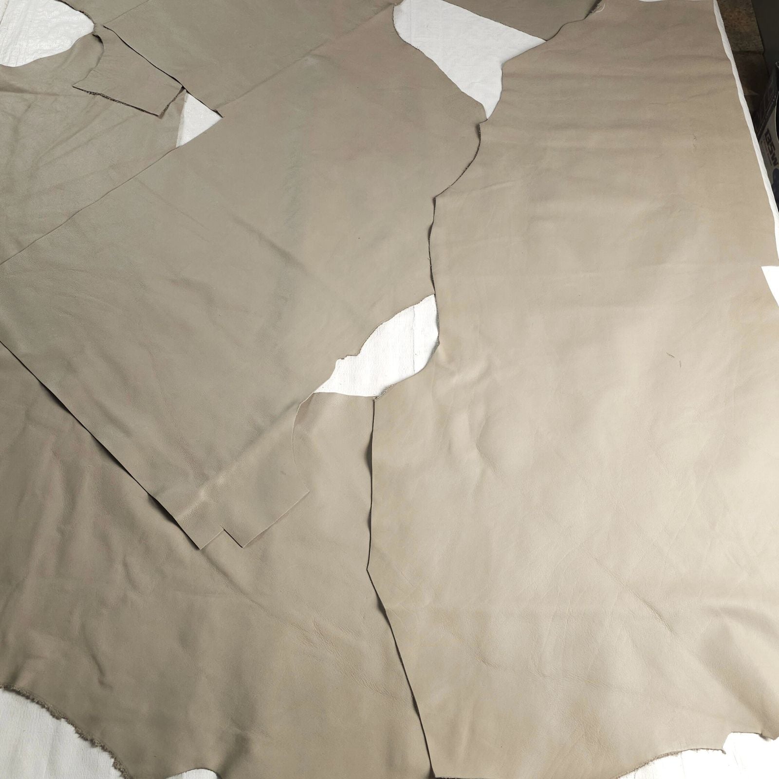 Warm taupe leather sections flat layout