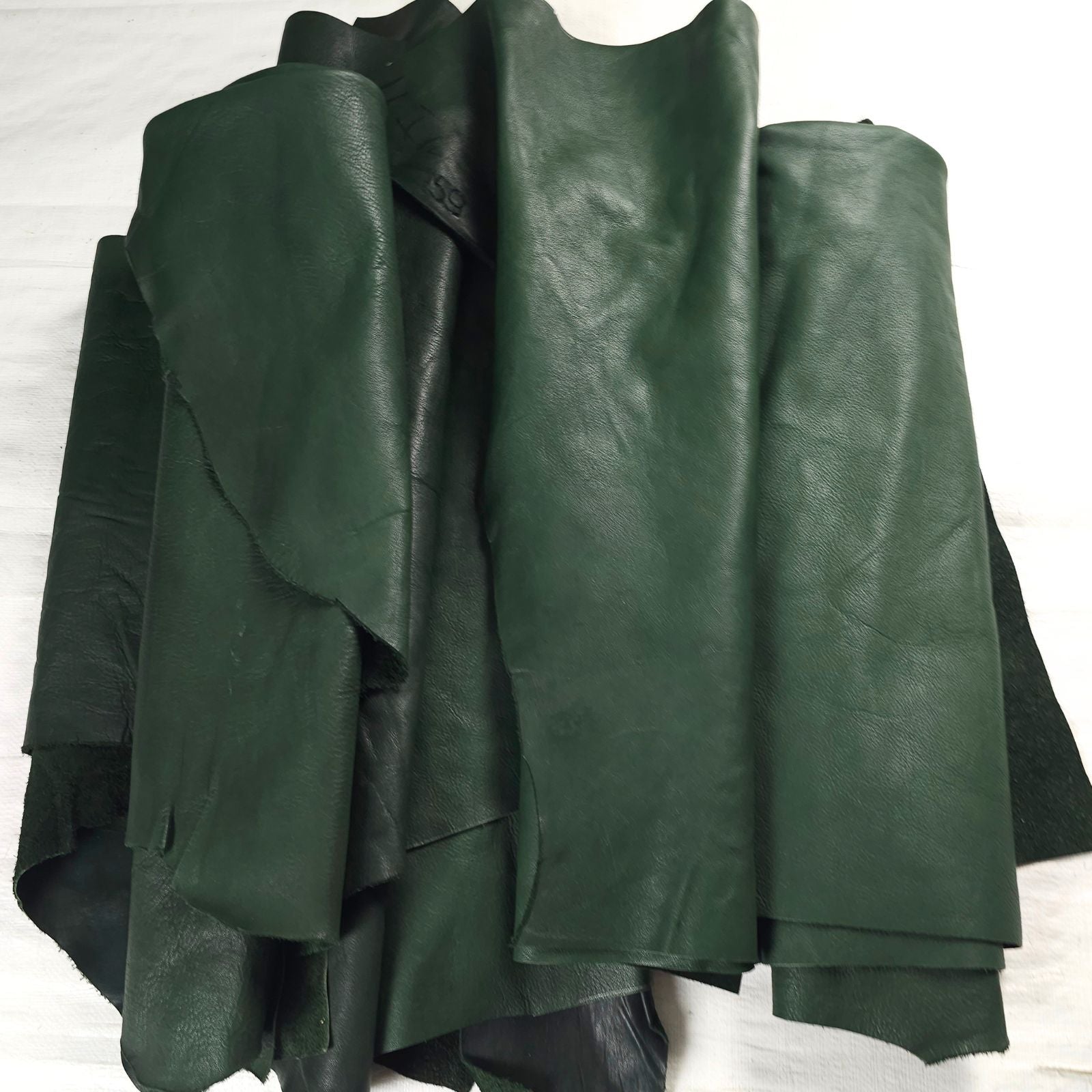 Vegetable tanned leather offcuts 4 kg, forest green,  large pieces.